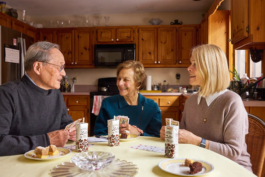 Lucille with friends playing cards